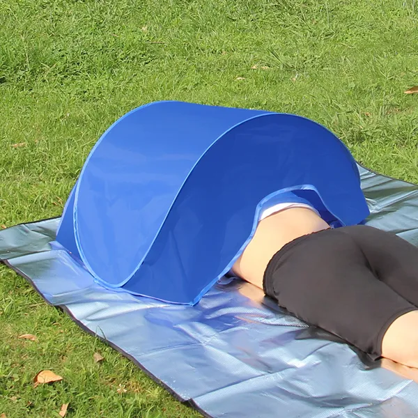 Shade over the head, lying on a mat