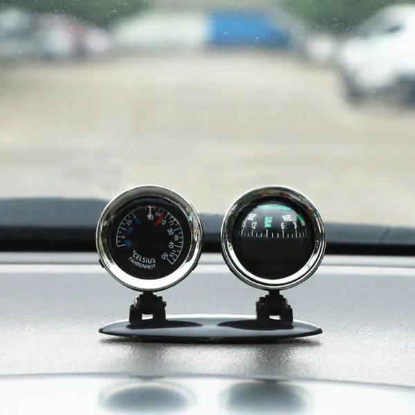 Compass and thermometer on a dashboard