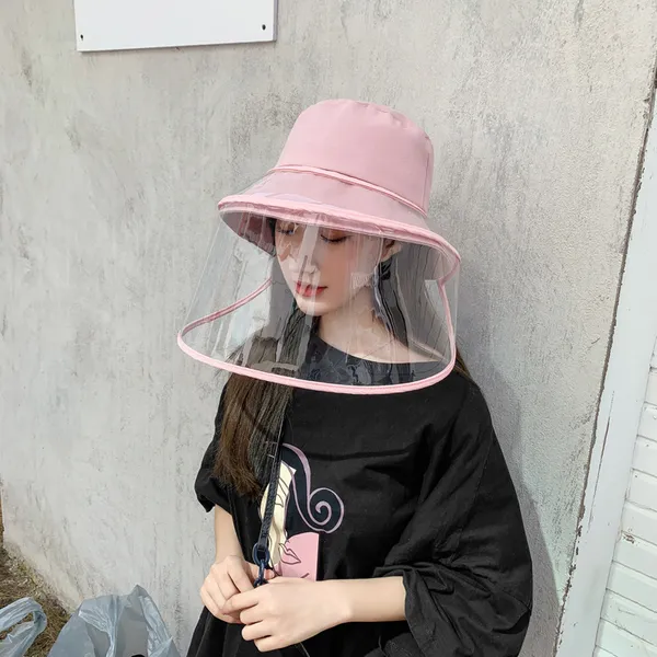 Pink hat worn with its clear visor