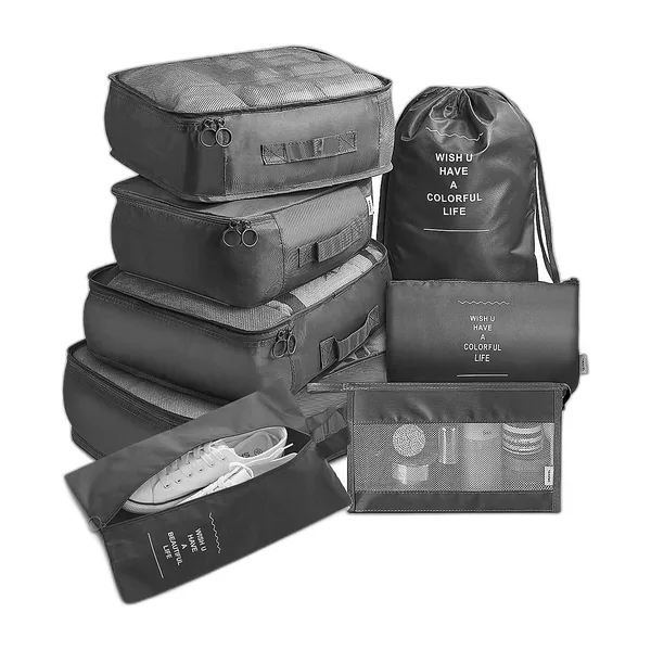 Set de huit sacs de rangement noirs pour valise, empilés