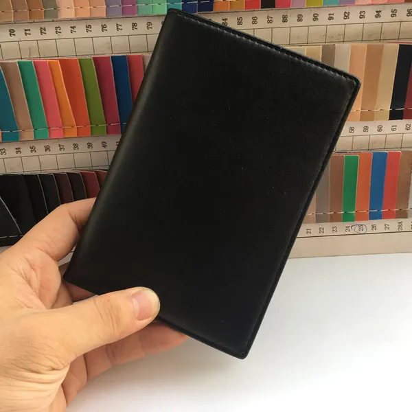 Passport holder held in hand