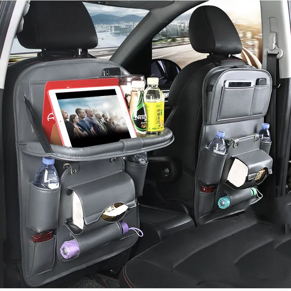 Grey organiser hung on the back of a front seat